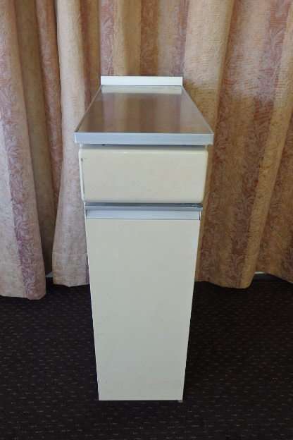 An awesome vintage "Retro" multi-purpose single door metal cabinet with a stainless steel top
