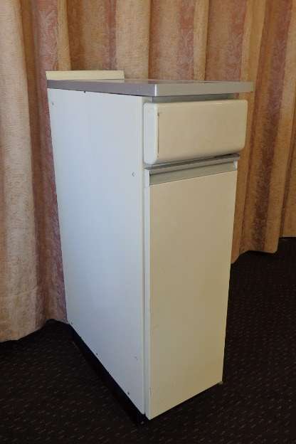 An awesome vintage "Retro" multi-purpose single door metal cabinet with a stainless steel top