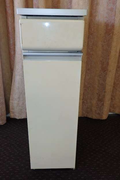 An awesome vintage "Retro" multi-purpose single door metal cabinet with a stainless steel top