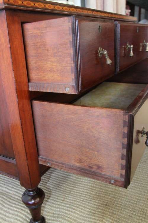 A magnificent solid teak tri-folding mirror dressing table w/ four drawers & marquetry detail
