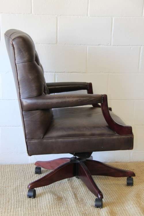 An amazing leather Chippendale style Executives (tilt and swivel) office chair in great condition!!!