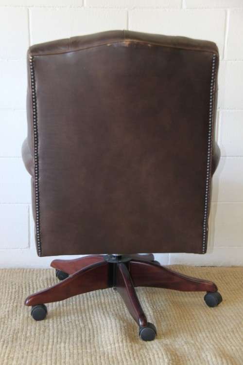 An amazing leather Chippendale style Executives (tilt and swivel) office chair in great condition!!!