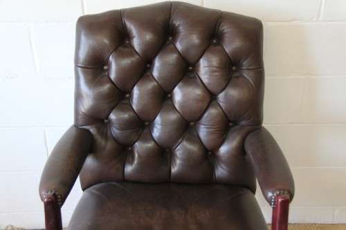 An amazing leather Chippendale style Executives (tilt and swivel) office chair in great condition!!!