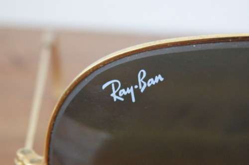 A wonderful pair of vintage authentic Ray Ban aviators in original brown pouch in good condition