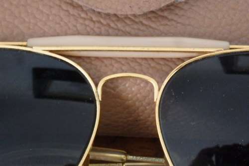 A wonderful pair of vintage authentic Ray Ban aviators in original brown pouch in good condition