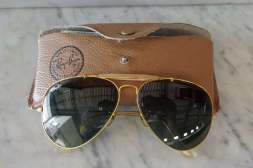 A wonderful pair of vintage authentic Ray Ban aviators in original brown pouch in good condition