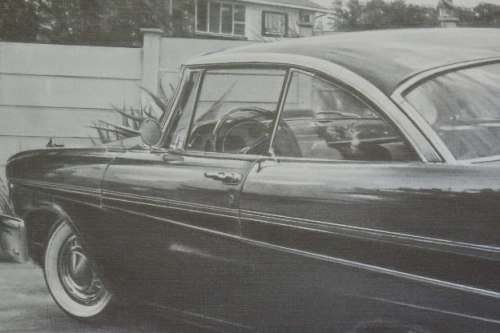 A signed limited edition print (no. 224/ 250) of a 1958 Plymouth Belve by Dean Scott Simon RS17