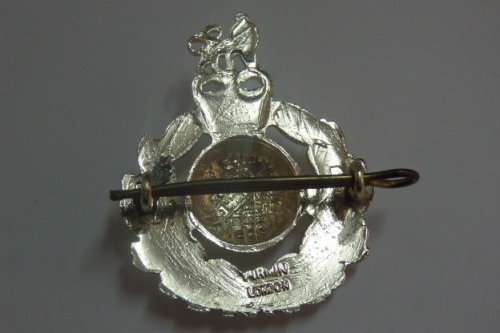 A Fantastic British "The Royal Marines" Cap Badge with Kings Crown