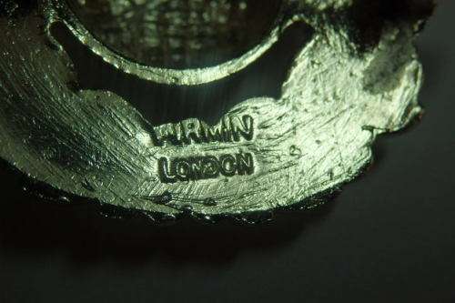 A Fantastic British "The Royal Marines" Cap Badge with Kings Crown