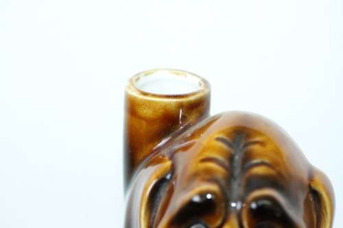 An awesome vintage "stoneware" Dog character decanter with a cork lined stopper