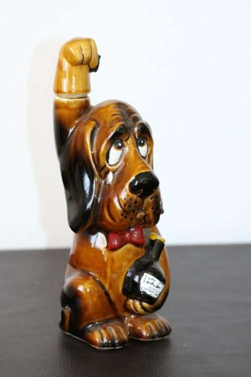 An awesome vintage "stoneware" Dog character decanter with a cork lined stopper