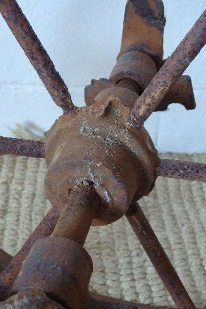 An awesome antique cast iron double-rimmed six-spoke Plough Wheel, perfect for any garden decor