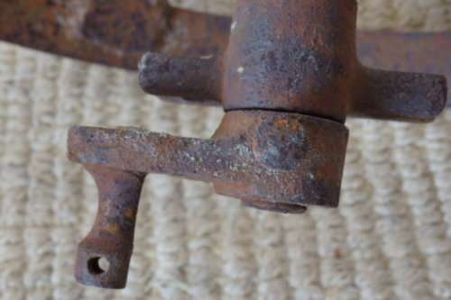 An awesome antique cast iron double-rimmed six-spoke Plough Wheel, perfect for any garden decor