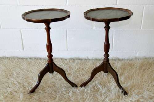 Two magnificent antique Victorian mahogany tri-leg occasional tables w/ leather clad tops- bid/table