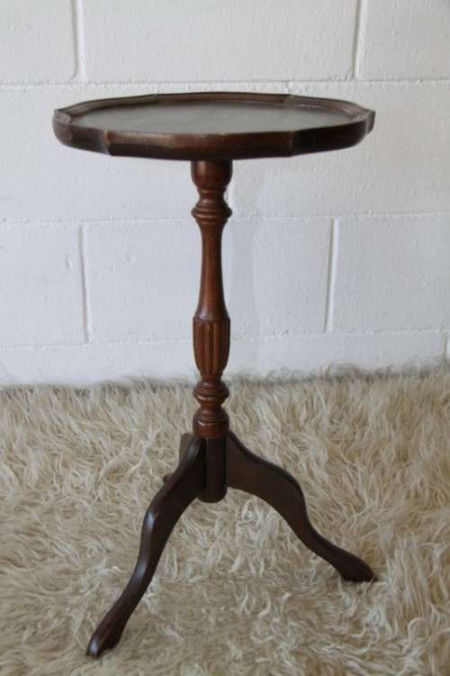Two magnificent antique Victorian mahogany tri-leg occasional tables w/ leather clad tops- bid/table