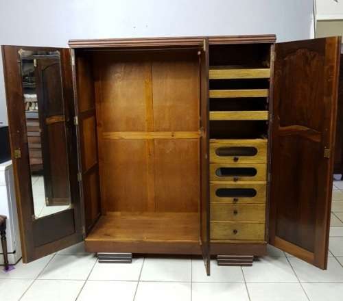 A spectacular Art Deco three-door solid Imbuia wardrobe with 8x drawers and loads of hanging space
