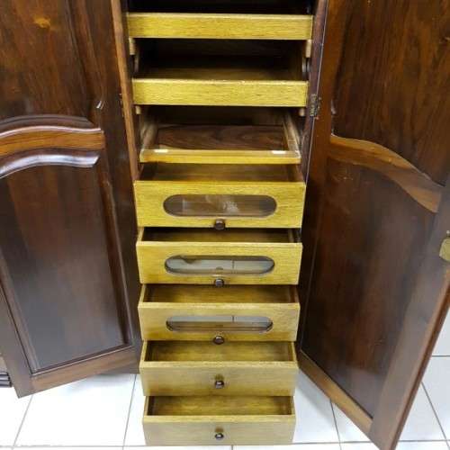 A spectacular Art Deco three-door solid Imbuia wardrobe with 8x drawers and loads of hanging space