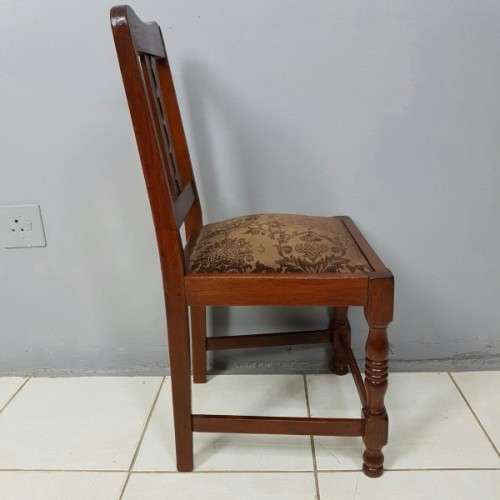 A beautiful and newly upholstered antique Edwardian occasional chair with beautiful turned legs