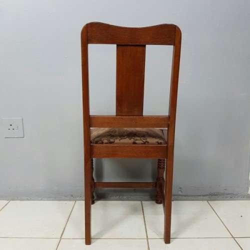 A beautiful and newly upholstered antique Edwardian occasional chair with beautiful turned legs