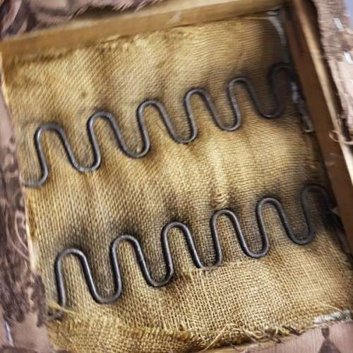 A beautiful and newly upholstered antique Edwardian occasional chair with beautiful turned legs