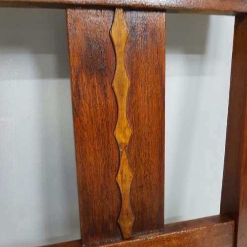 A beautiful and newly upholstered antique Edwardian occasional chair with beautiful turned legs