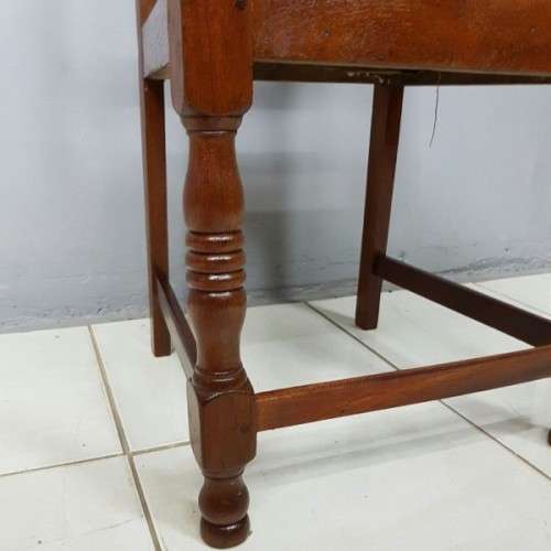 A beautiful and newly upholstered antique Edwardian occasional chair with beautiful turned legs