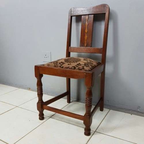 A beautiful and newly upholstered antique Edwardian occasional chair with beautiful turned legs