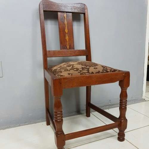 A beautiful and newly upholstered antique Edwardian occasional chair with beautiful turned legs