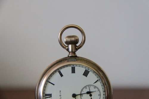 A spectacular Victorian antique (1914) "Elgin" gold plated pocket watch in perfect working condtion