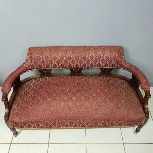 Magnificent antique Victorian carved Mahogany Sofa on its original castors with period fabric RS17