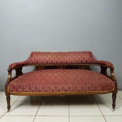 Magnificent antique Victorian carved Mahogany Sofa on its original castors with period fabric RS17