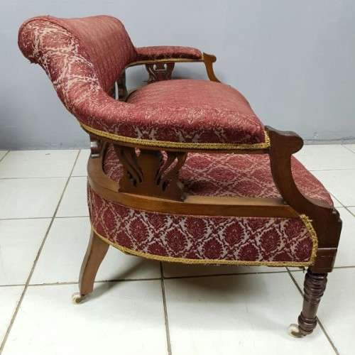 Magnificent antique Victorian carved Mahogany Sofa on its original castors with period fabric RS17