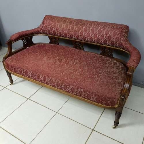 Magnificent antique Victorian carved Mahogany Sofa on its original castors with period fabric RS17