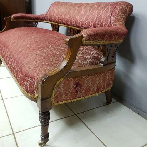 Magnificent antique Victorian carved Mahogany Sofa on its original castors with period fabric RS17