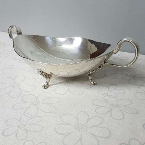 A stunning large vintage Rhodesian silver plated "double-handle" footed serving bowl w/ beaded edge