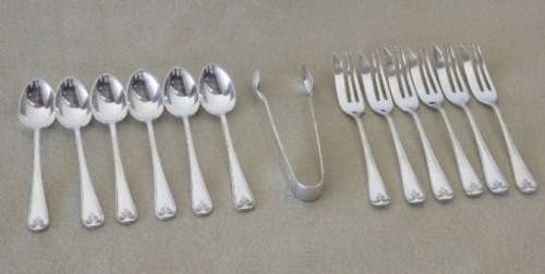 An incredible boxed EPNS silver plated teaspoon & cake fork set w/ sugar tongs in stunning condition