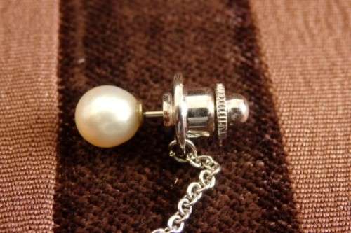 A stunning vintage genuine "Akoya" cultured white pearl gentleman's tie tack in its original box