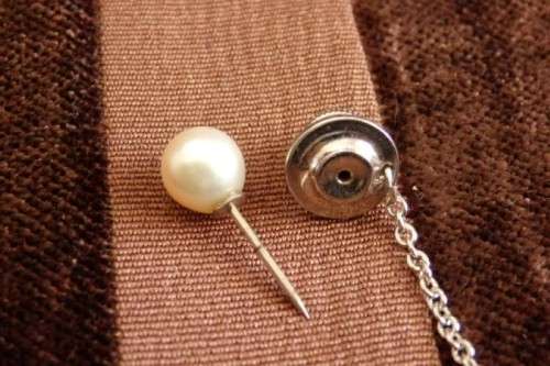 A stunning vintage genuine "Akoya" cultured white pearl gentleman's tie tack in its original box