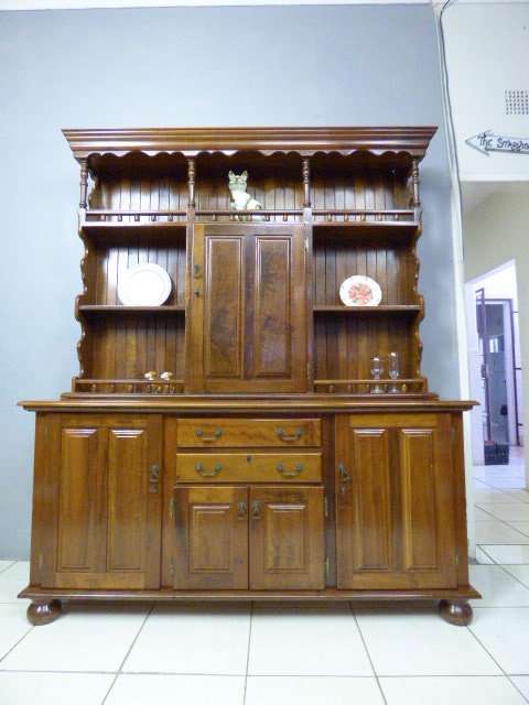 A magnificent walnut buffet cabinet w/ optics and 15 bottle wine rack. Magnificent quality!!!