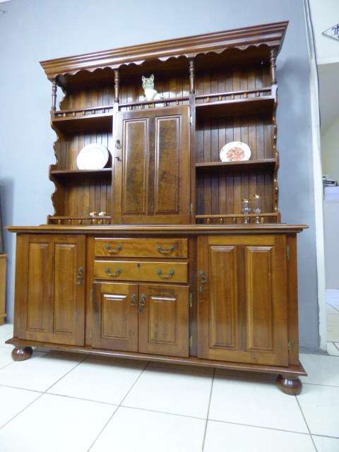 A magnificent walnut buffet cabinet w/ optics and 15 bottle wine rack. Magnificent quality!!!