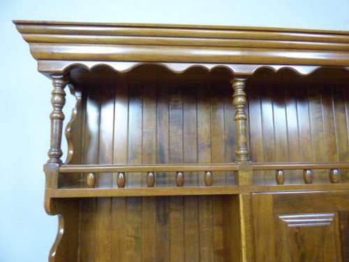 A magnificent walnut buffet cabinet w/ optics and 15 bottle wine rack. Magnificent quality!!!