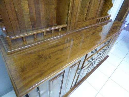 A magnificent walnut buffet cabinet w/ optics and 15 bottle wine rack. Magnificent quality!!!