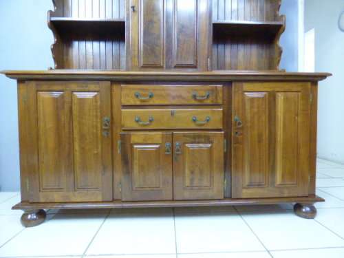 A magnificent walnut buffet cabinet w/ optics and 15 bottle wine rack. Magnificent quality!!!