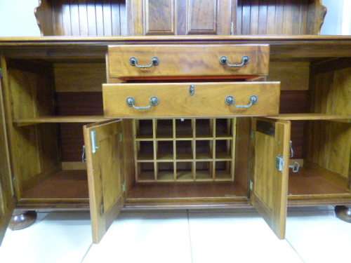 A magnificent walnut buffet cabinet w/ optics and 15 bottle wine rack. Magnificent quality!!!