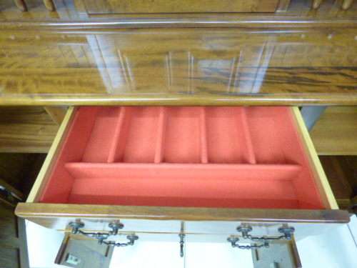 A magnificent walnut buffet cabinet w/ optics and 15 bottle wine rack. Magnificent quality!!!