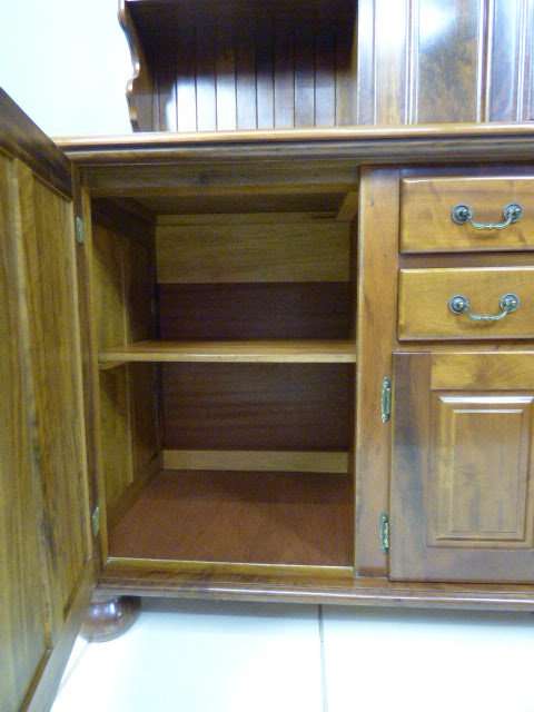 A magnificent walnut buffet cabinet w/ optics and 15 bottle wine rack. Magnificent quality!!!