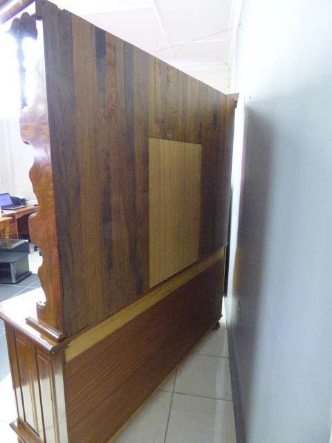 A magnificent walnut buffet cabinet w/ optics and 15 bottle wine rack. Magnificent quality!!!