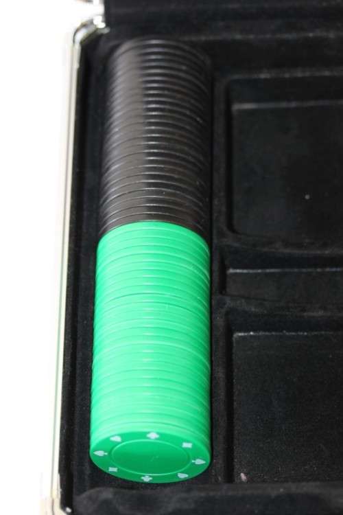 An awesome 100-chip mini poker set in a case in stunning condition