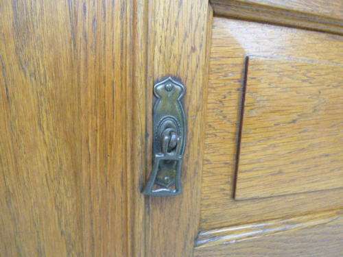 A spectacular vintage Oak wash stand with a solid black marble top & spacious cupboard on castors