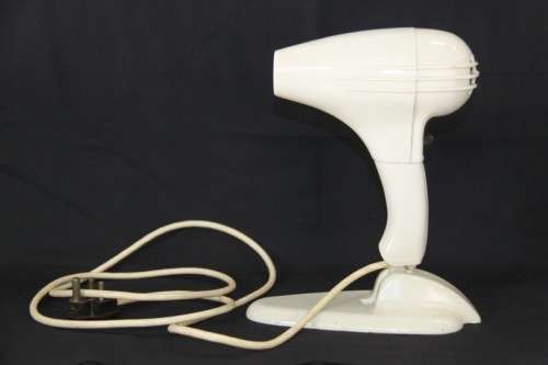 An exquisite vintage (1955) General Electric hair dryer w/ box & stand in perfect working condition